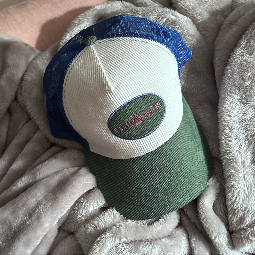 green cream blue pink trucker hat